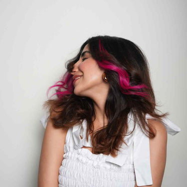 Kinky Pinky – #Strandout- Coloured clip-In Hair